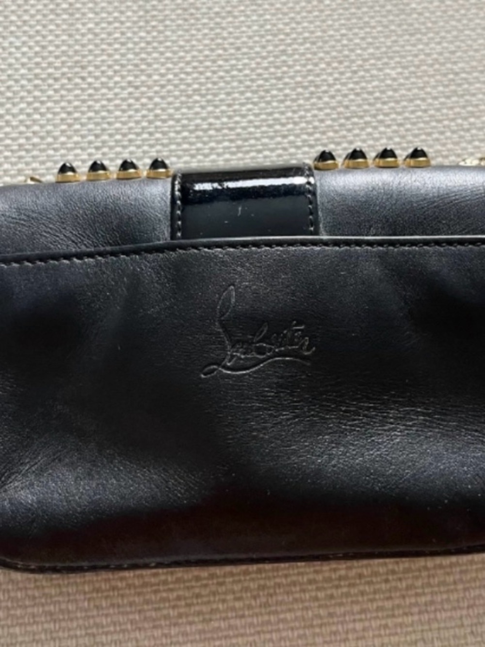 Authentic Christian Louboutin Black Studded Bow Crossbody Bag with Gold Accents - Picture 2 of 6